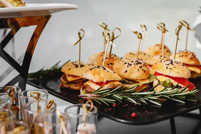 An event catering event with close-ups of burgers