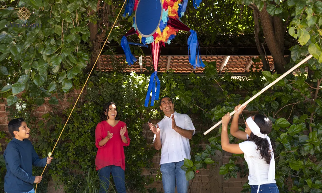 The pinata is being played with by a medium shot