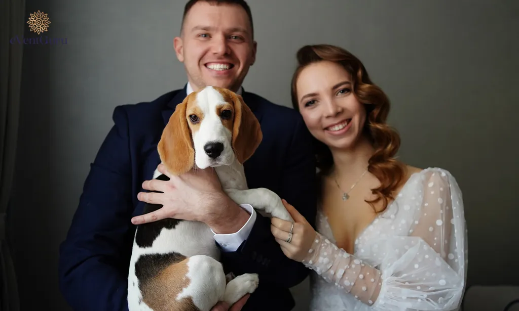 The newlyweds with their dog breed beagle. On the day of their wedding, their pets were with them.