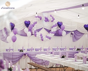 White and purple balloons decorated in the company hall