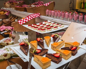 Wide selectin of pastry products in a pretty buffet in the bakery