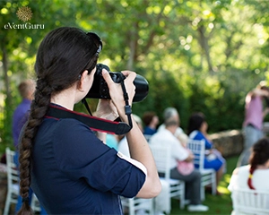 Photographer clicking wedding ceremony photography
