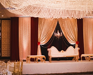 reception decor in traditional Reds and golds